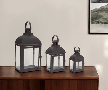 Set of Three Clear and Black Glass and Metal Floor Lantern Candle Holders